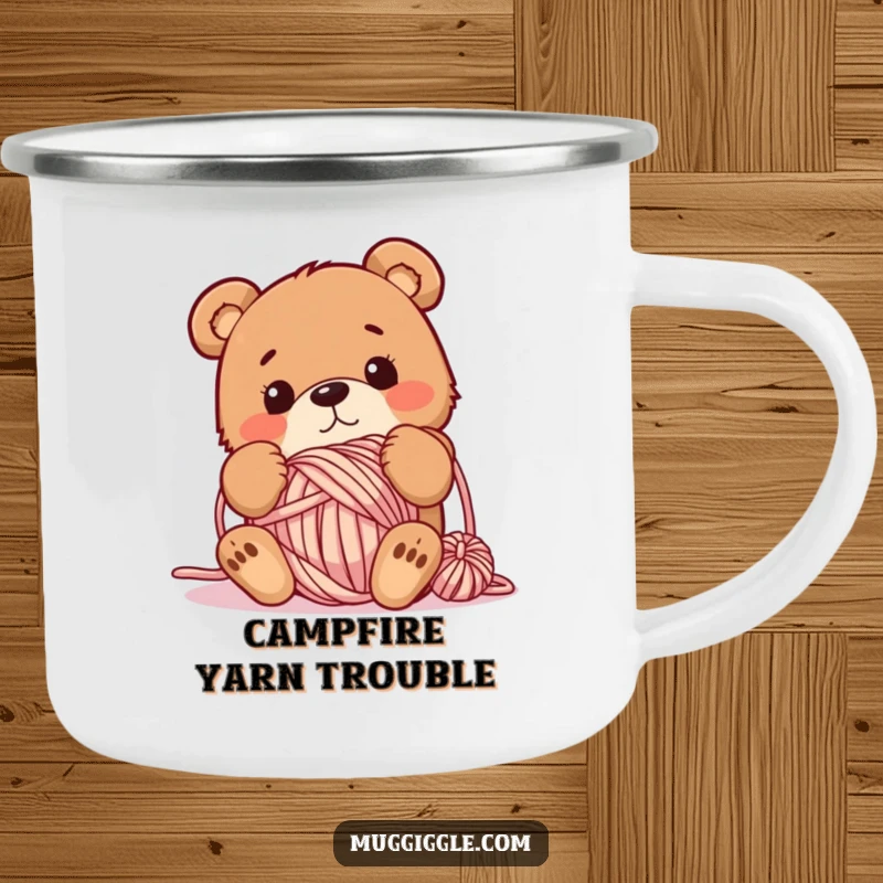 Funny camping mug with a bewildered bear tangled in yarn, perfect for artists and crafters enjoying the outdoors with a touch of humor.