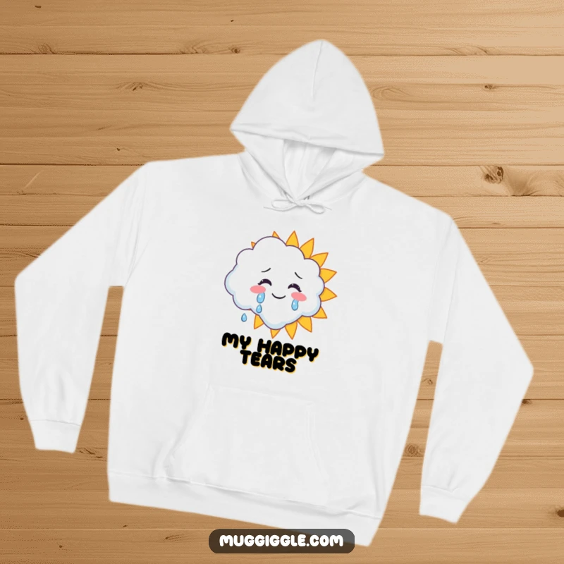 Funny hoodie featuring a cloud character releasing happy tears onto a smiling sun, offering cozy emotional warmth.