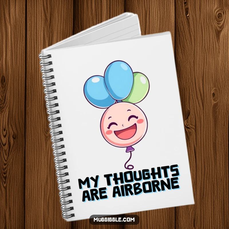 Funny notebook with a cheerful balloon character floating upside down and grinning, perfect for jotting down ideas with a dose of happiness, a funny gift.