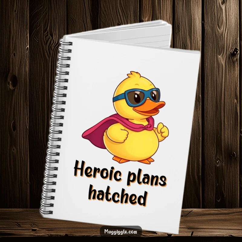 Funny notebook cover featuring a rubber ducky superhero in a cape, striking a heroic pose, ready for epic ideas.