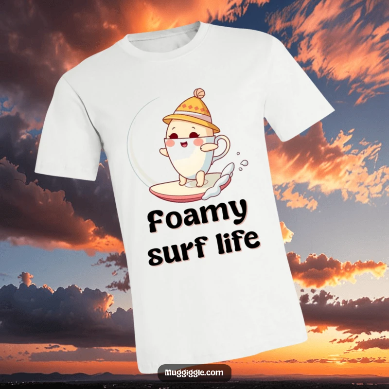 Funny T-Shirt showing a bewildered teacup wearing a small hat, precariously surfing a large, shimmering bubble.