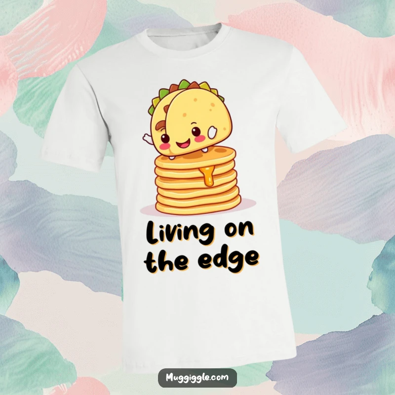 Funny T-Shirt: Cheerful taco character attempts to balance on a wobbly pancake stack, a funny food adventure.