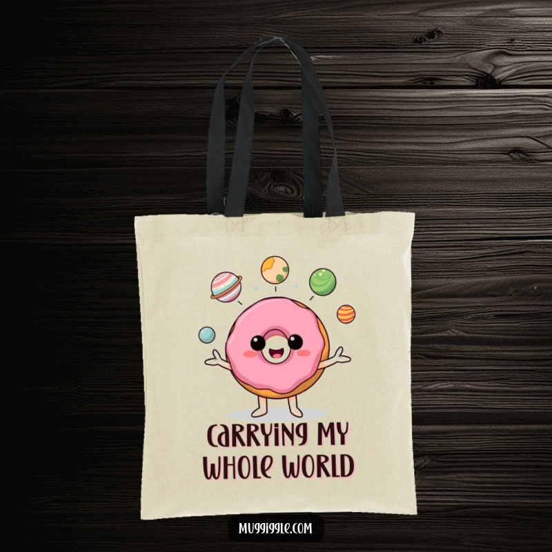 Funny donut character juggling miniature planets, depicted on a durable tote bag, ready for errands.