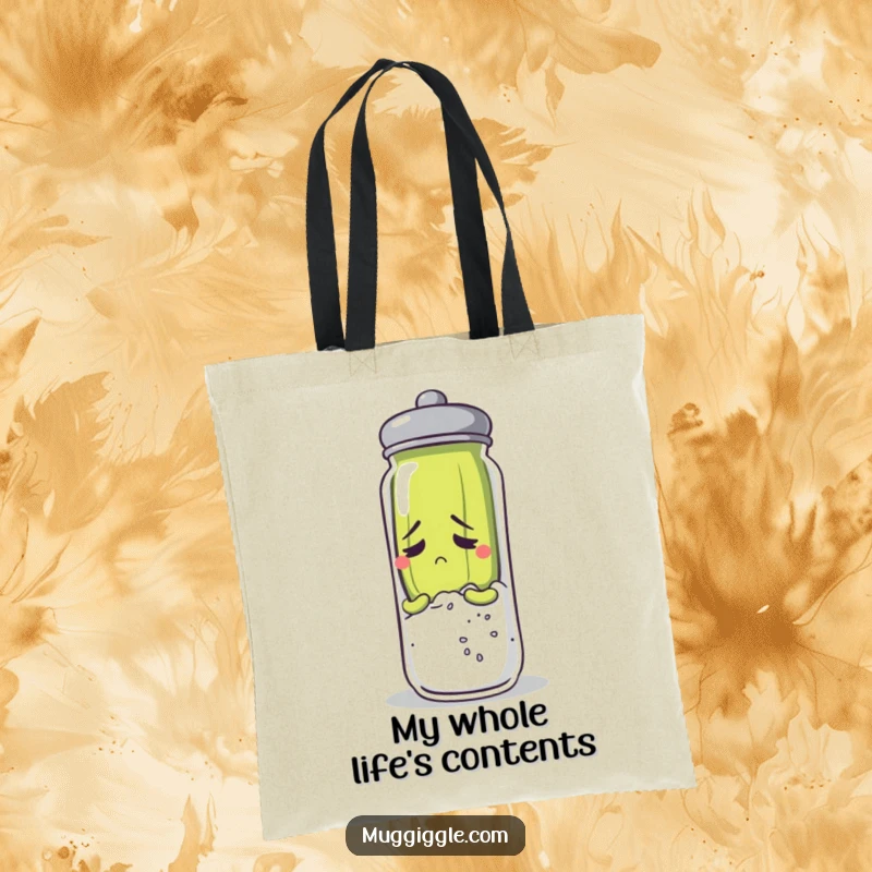 Funny pickle character attempting to hide behind a giant salt shaker, printed on a tote bag.